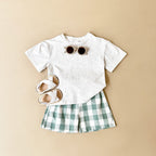Conjunto Verão Bebê Dinossauro | Camiseta Estampada + Shorts Xadrez 6M-3 Anos