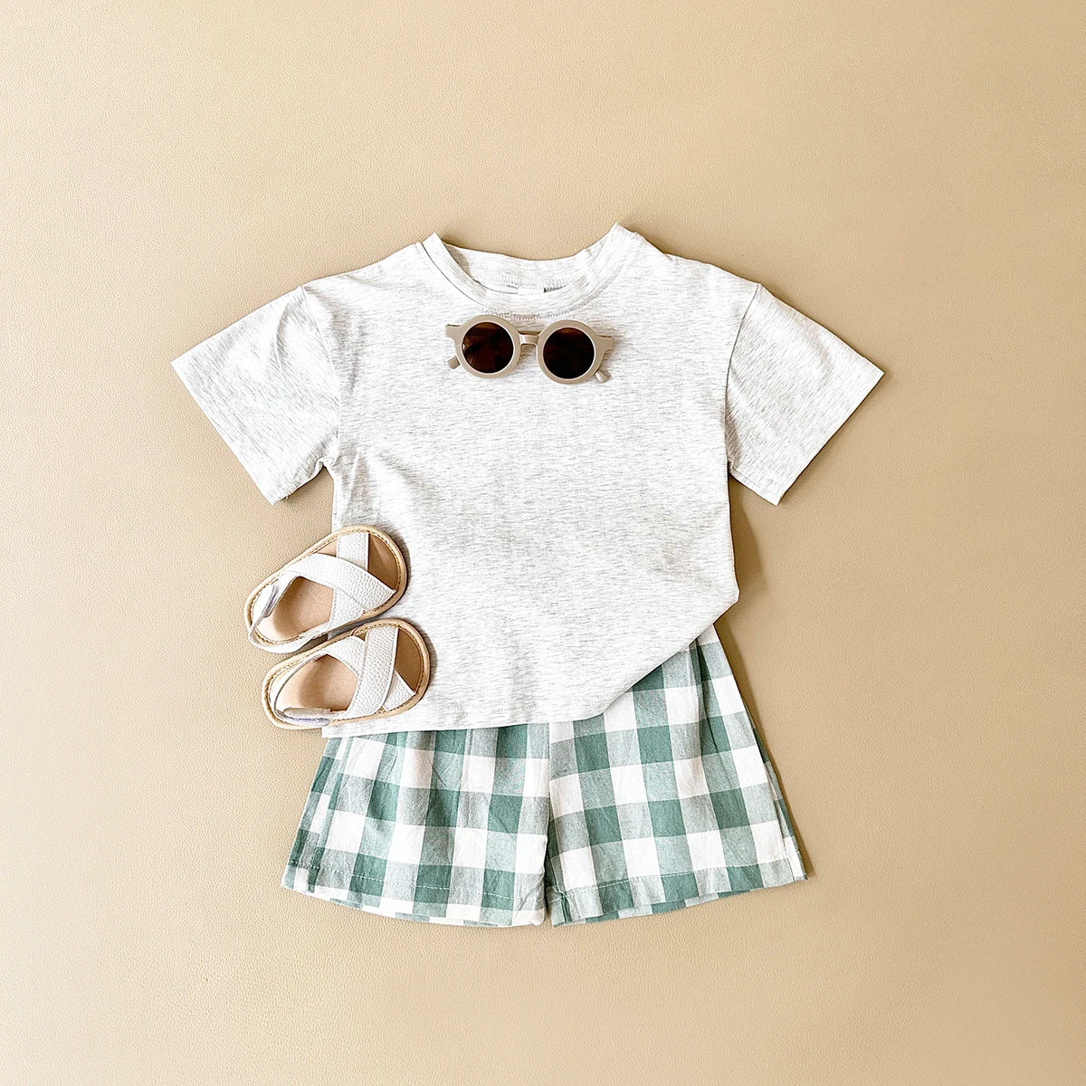 Conjunto Verão Bebê Dinossauro | Camiseta Estampada + Shorts Xadrez 6M-3 Anos